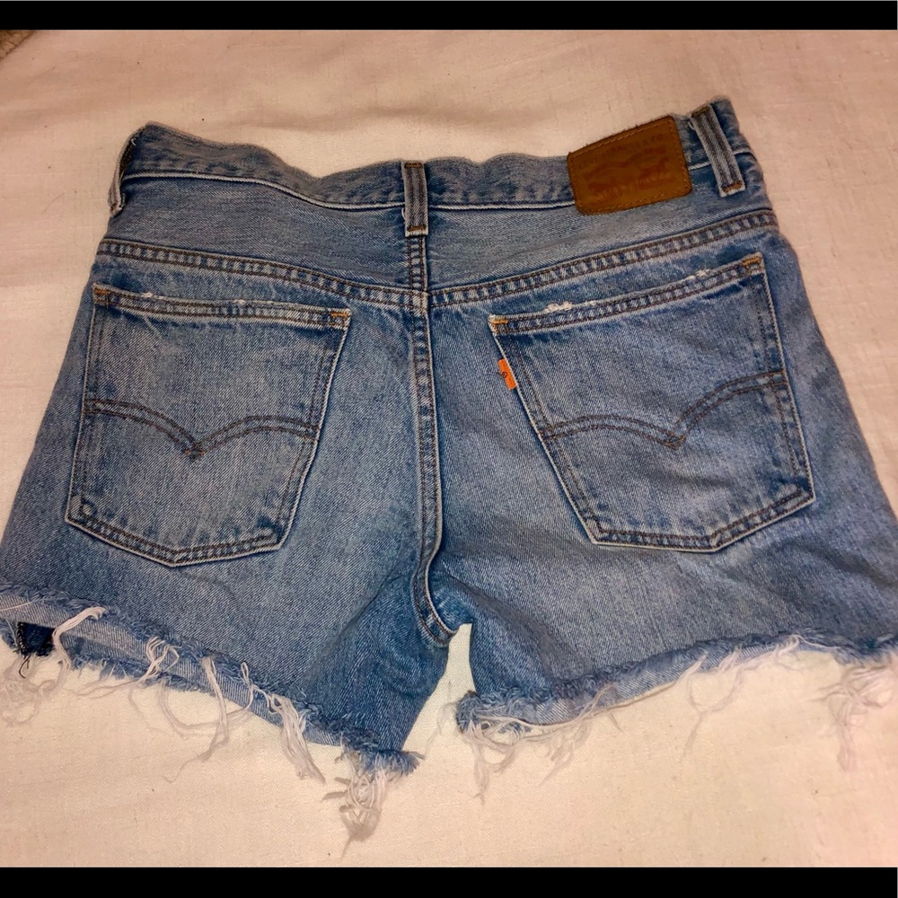 Trendy cutoff Levi’s Jean shorts.